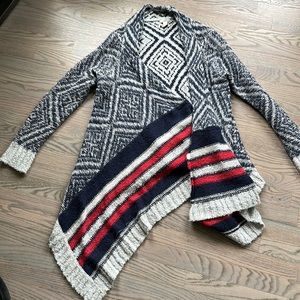Sweater with shawl style front. Blue and grey with red striping along bottom